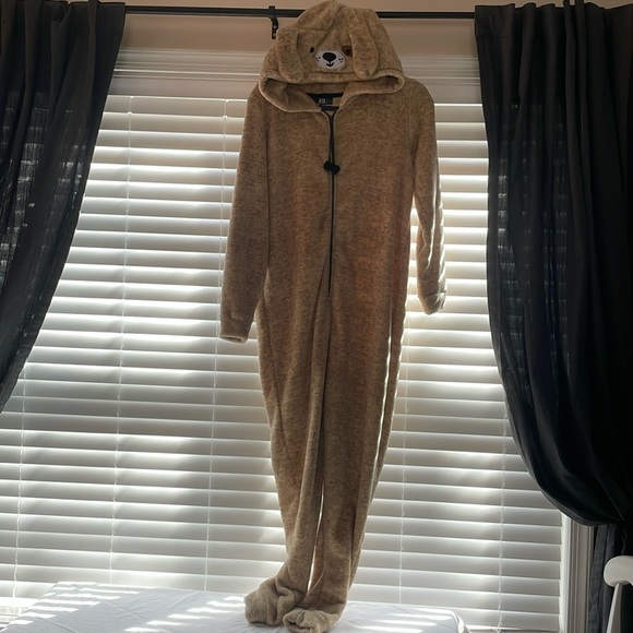 This cute dog onesie pajama is super soft and comfy. This is a size Medium. - Picture 1 of 2